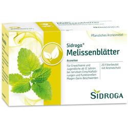Verpackung von Sidroga Melissenblätter-Tee mit grünen Blättern auf gelbem Hintergrund.